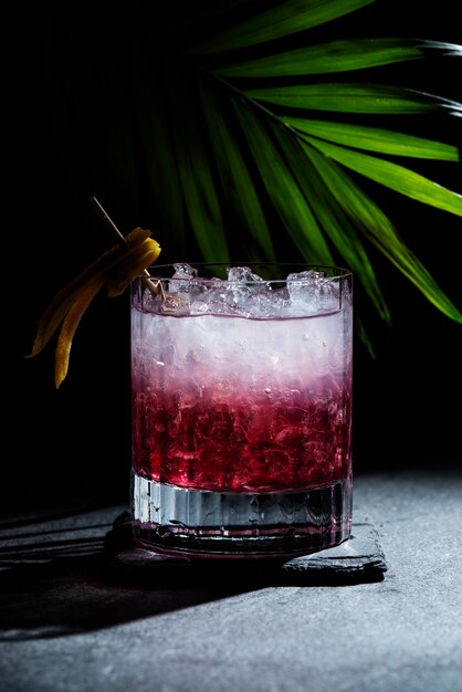 Daiquiri cocktail with ice and leaves arrangement