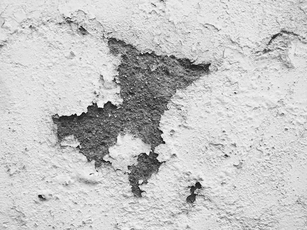 Damaged white wall plaster background texture