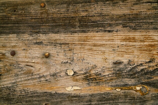 Damaged wood with nails