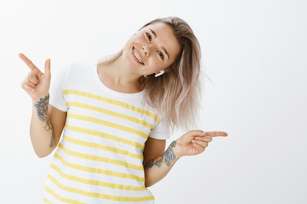 dancing blonde girl posing in the studio