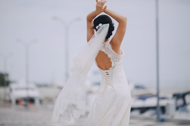 Dancing bride at the port