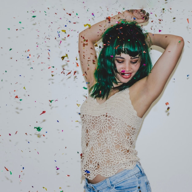 Free photo dancing girl with confetti