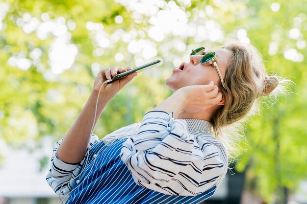 Dancing in the park and singing