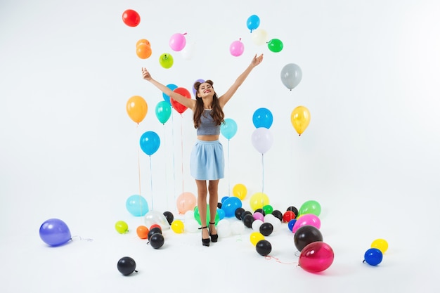 Dancing place. Stylish young girl celebrating birthday dancing, having fun