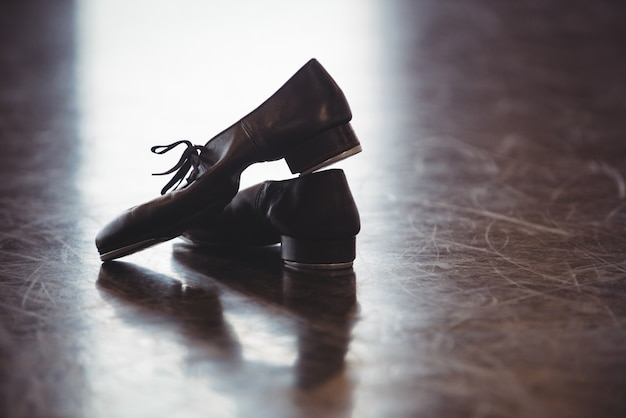 Free photo dancing shoes on wooden floor