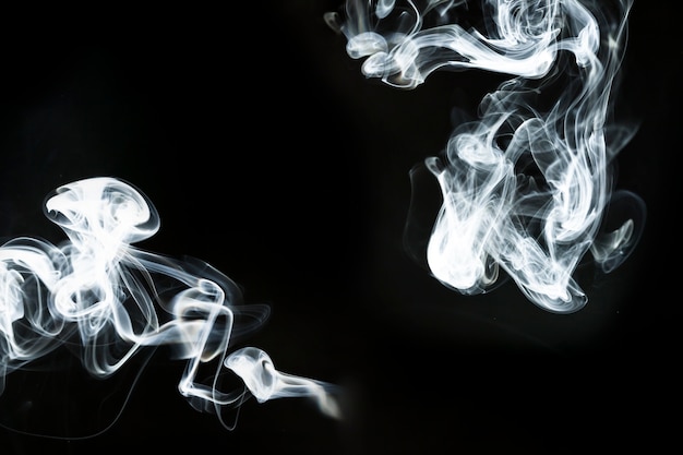 Dark background with great smoke silhouettes