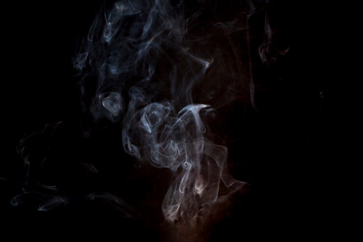 Free Photo dark background with smoke and orange details