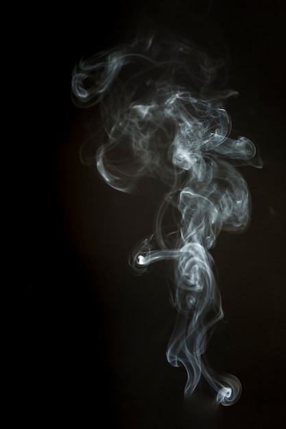 Dark background with smoke