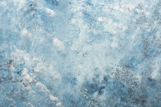 ダークブルーの質感の漆喰壁の背景