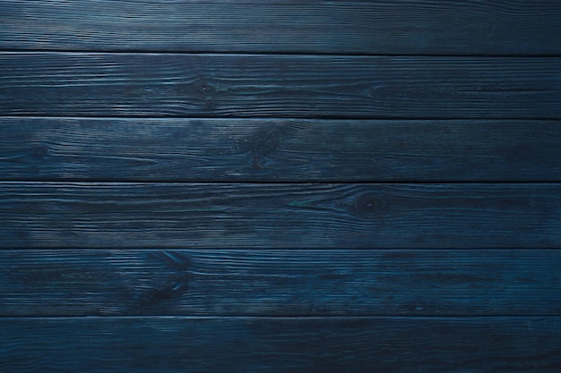 Free photo dark blue wooden background background for different wooden backgrounds concept