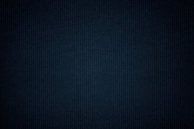 Dark corduroy fabric textured background