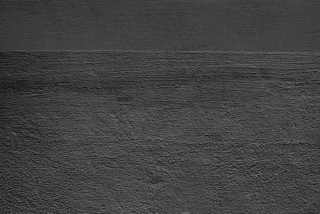 Dark gray plain concrete textured background