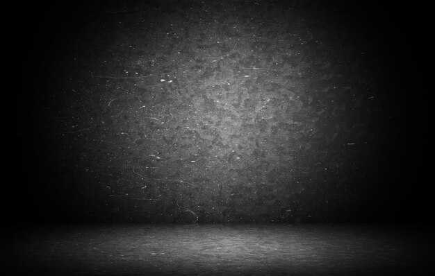 Dark grunge textured wall closeup - well use as digital studio background