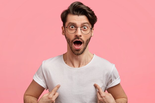 Dark-haired man with round glasses