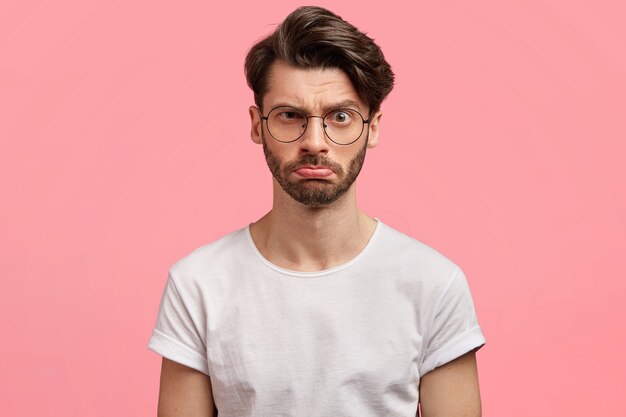 Dark-haired man with round glasses