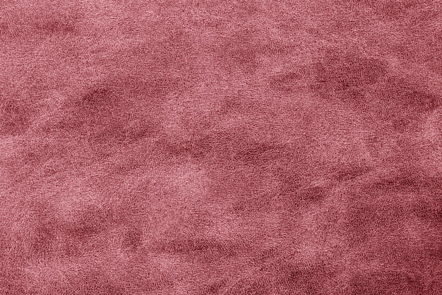 Dark pink shiny textured paper background