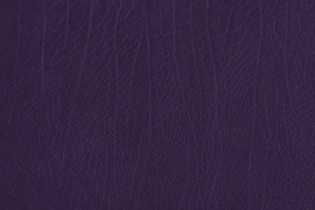 Dark purple creased leather textured background