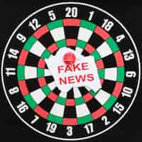 Free photo dartboard with fake news