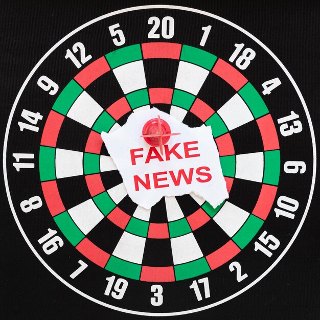 Dartboard with fake news