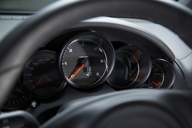 Dashboard of a luxury car under the lights