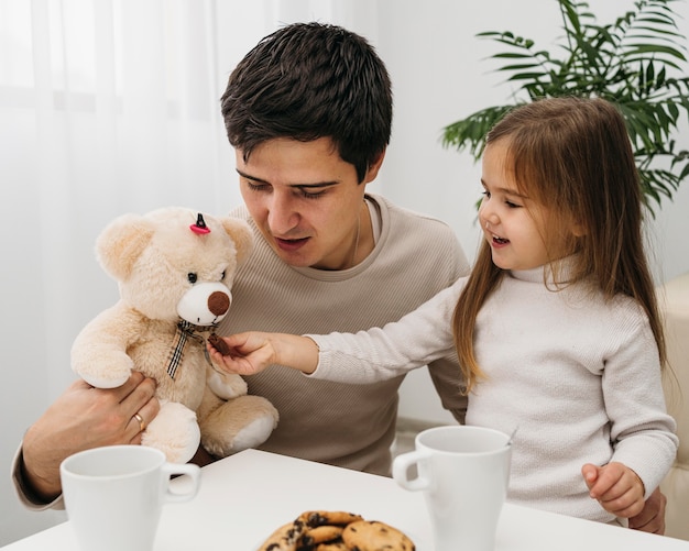 Daughter spending time with her father at home