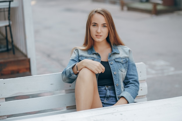 Free photo day outdoor table posing girl