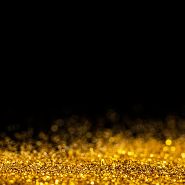 Dazzling gold glitter with copy space