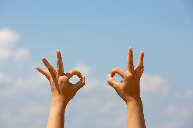 Deaf asia woman using sign language.