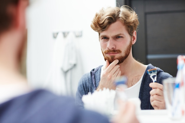 Free photo deciding to shave