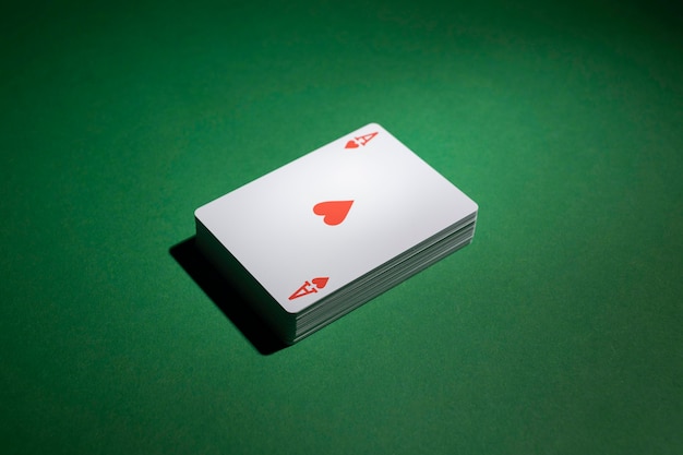 Deck of cards on green background