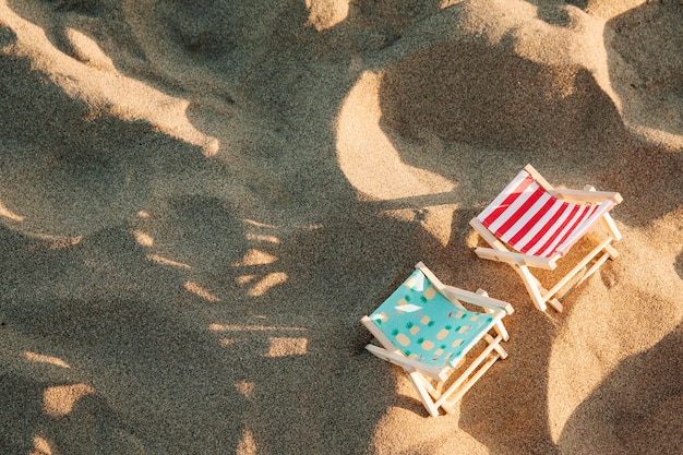 Deck chairs at the beach top view