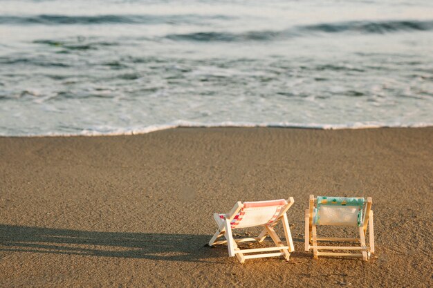 Deck chairs close to the shoreline