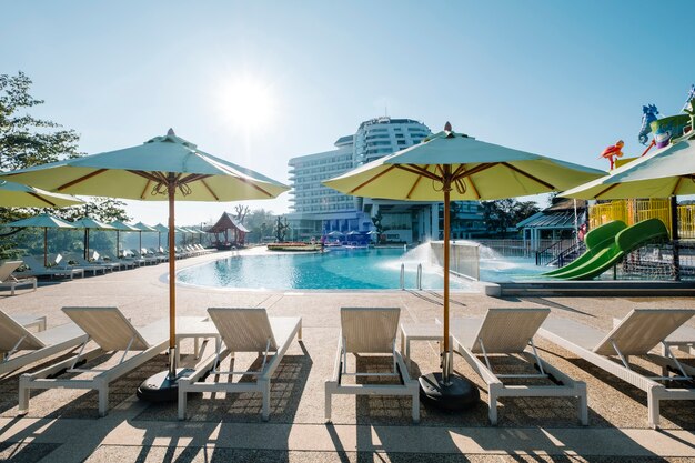 deckchair and swimming pool in hotel