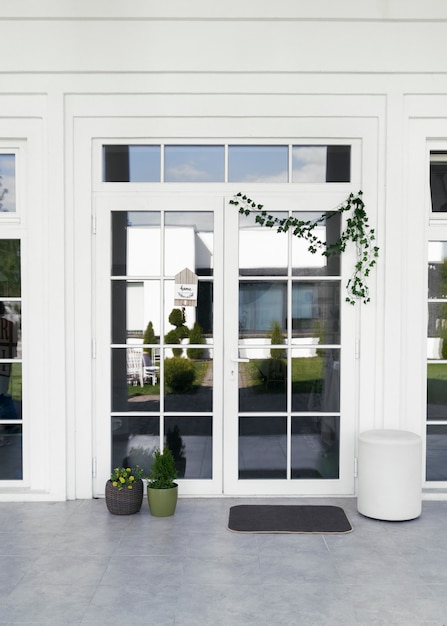 Decorated front door with plant