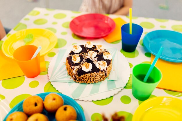 Decorated table with party snacks