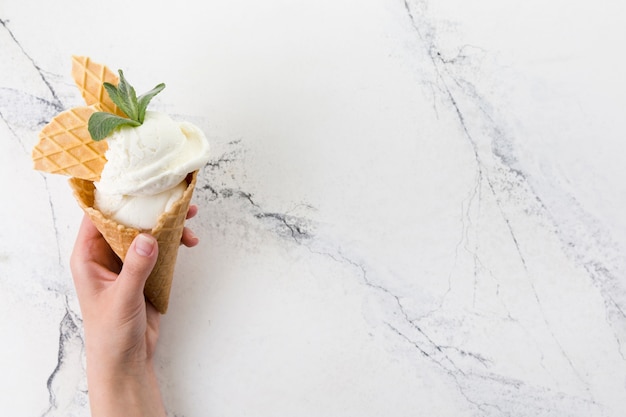 Decorated vanilla ice cream waffle cone