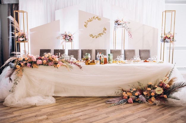 Decorated wedding tables and hall interior