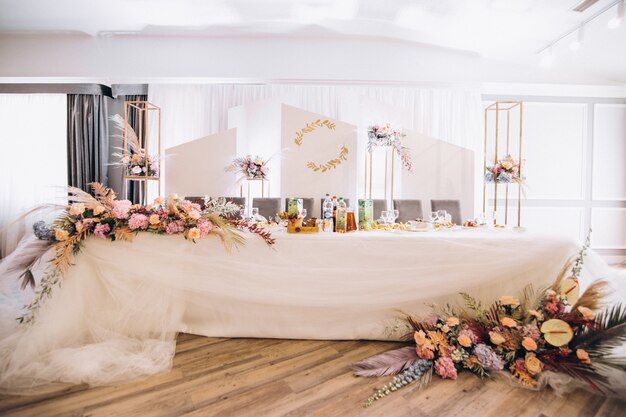 Decorated wedding tables and hall interior