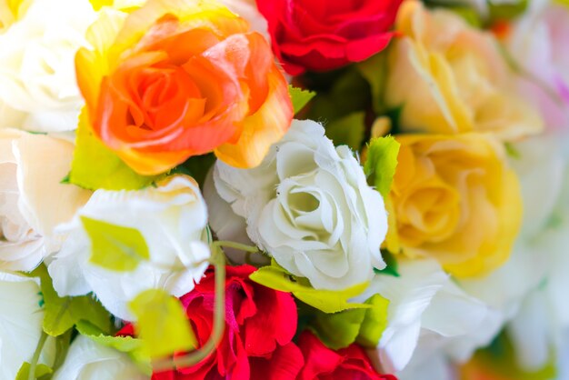 Decoration artificial flower on table ( Filtered image processed