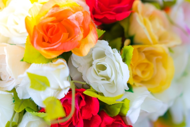 Decoration artificial flower on table ( Filtered image processed