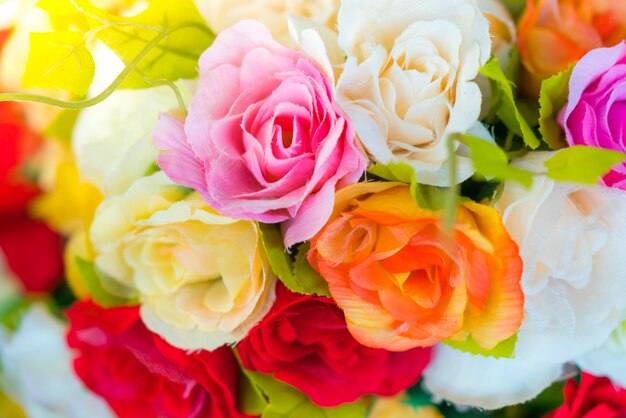 Decoration artificial flower on table ( Filtered image processed