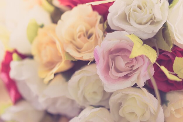 Decoration artificial flower on table ( Filtered image processed