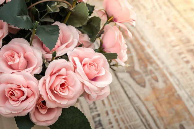 Decoration artificial flower on table ( Filtered image processed