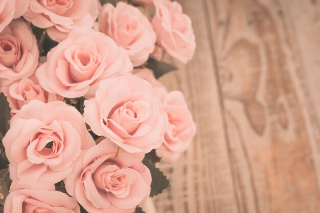 Decoration artificial flower on table ( Filtered image processed