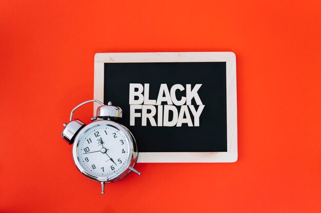 Decoration for black friday with clock on slate