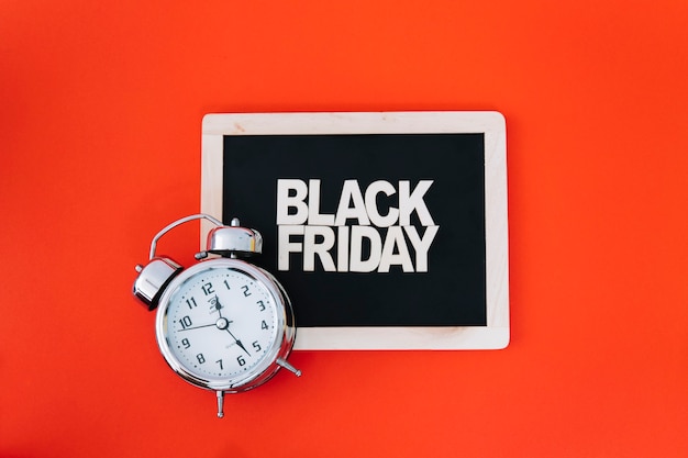 Decoration for black friday with clock on slate