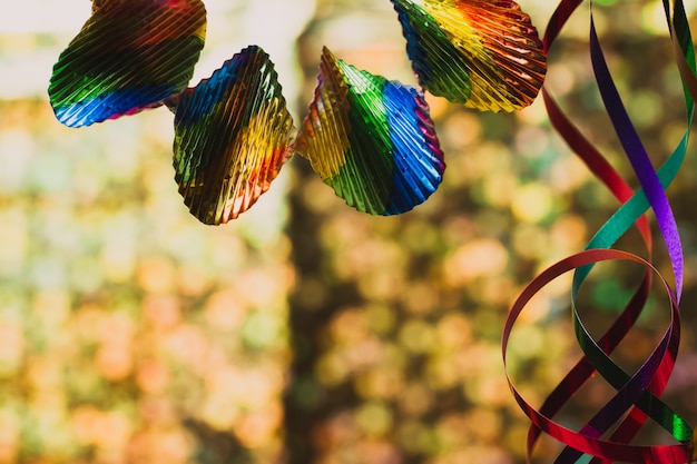 Decoration with colored ribbons close up with defocused background