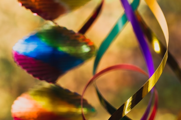 Decoration with colored ribbons close up with defocused background