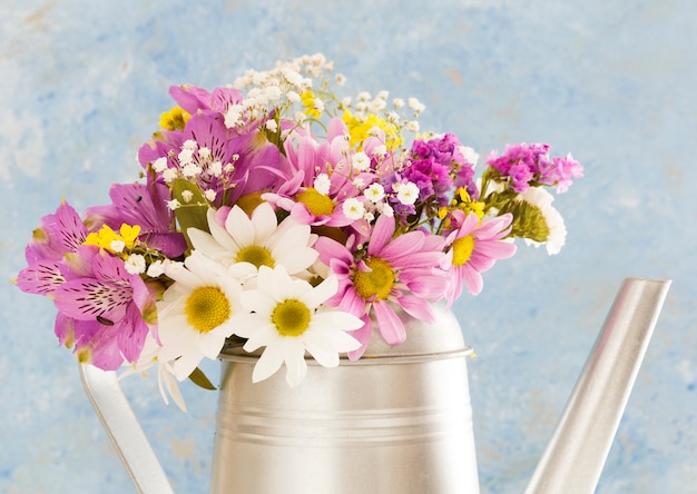 Decoration with flowers in a watering can