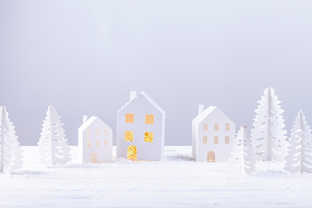 Free photo decoration with paper buildings and fir trees